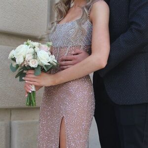 Ashley Lauren size 2 prom dress can fit smaller bc of the lace up back